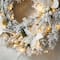 Glitzhome® 24" Pre-Lit Snow Flocked Greenery Pine Poinsettia Christmas Wreath & Matched 2 Pack 9ft. Garland Set